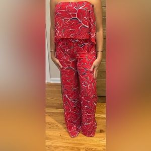 Red Amanda Uprichard strapless jumpsuit in medium.